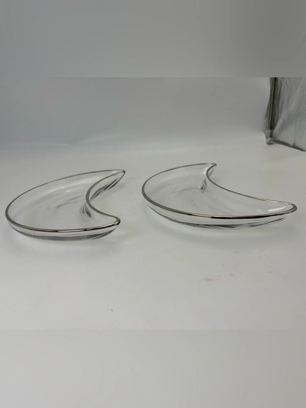 Pair of Vintage Clear Crescent Moon Glass Dishes with Silver Rim